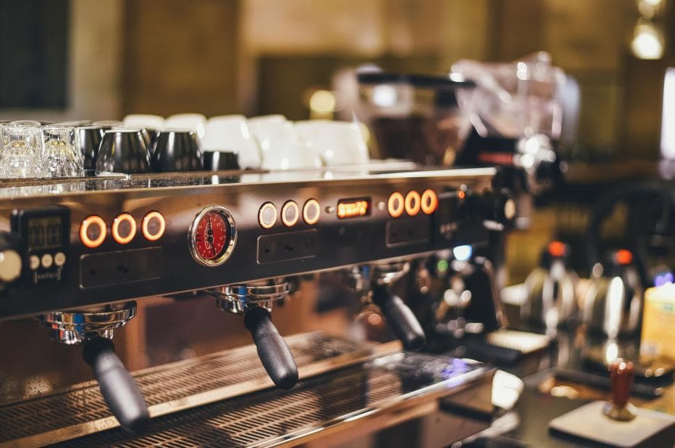Espresso brewing through a portafilter